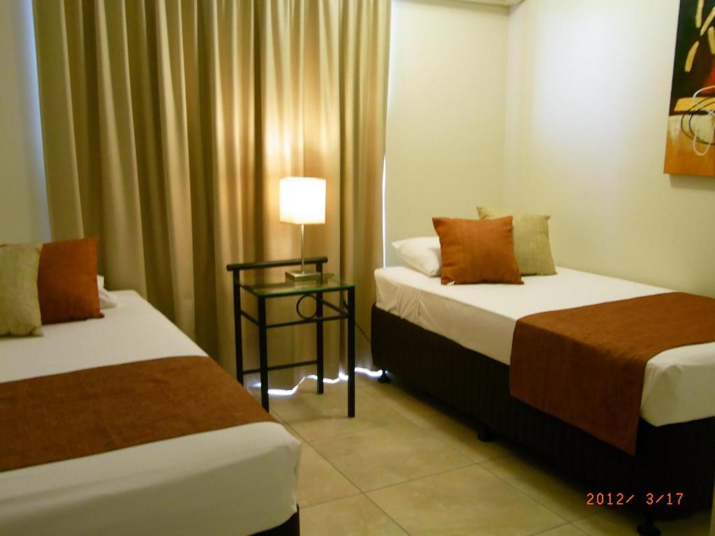 קאירנס Coral Towers Holiday Suites חדר תמונה